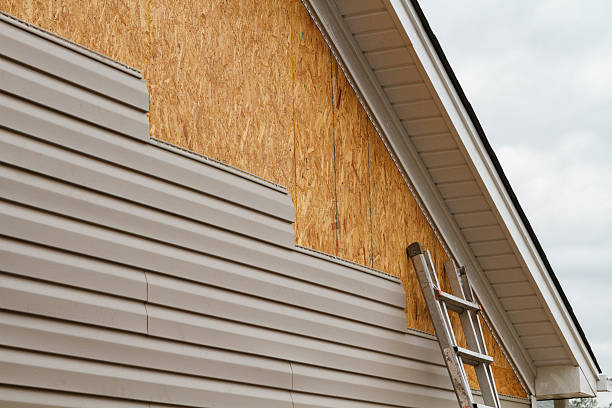 Professional Siding Contractor technician working in Wingate, NC